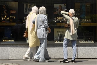 Women with headscarves shopping