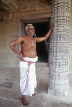 Temple priest standing Kampaheswarar temple in Thirubuvanam near Kumbakonam