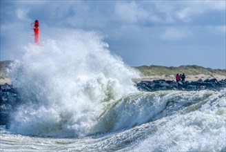 Strong swell with spray during storm at the pier in the harbour of Hvide Sande