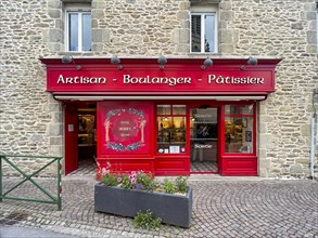 House facade and shop window of a typical French bakery