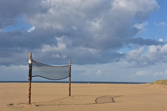 Lonely volleyball net on Amoreira beach