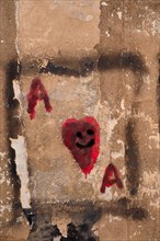 Painted Smiley Heart as Ace Card Painted on Wall