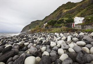 Coast with large round stones in Rocha da Relva