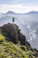 Hiker looking over landscape