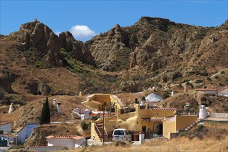Landscape with cave houses in cave district of Guadix