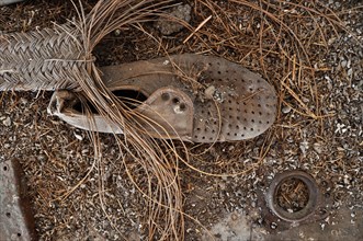 Men's suede shoe on the ground with rope of esparto grass