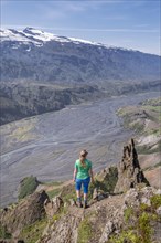 Hiker looking over landscape