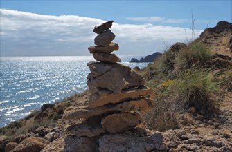 Stacked stones on the hiking trail from San Juan de los Terreros to Aguilas