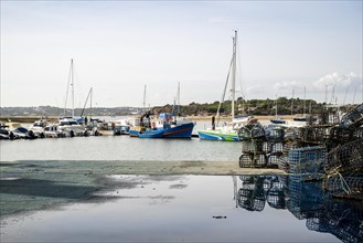Fishermen's harbor with yachts and octopus traps in Alvor