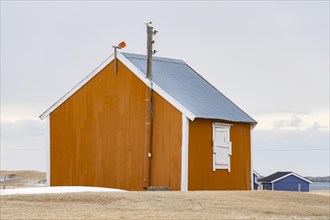 Scandinavian house in winter landscape