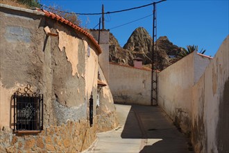 Alley in cave district of Guadix