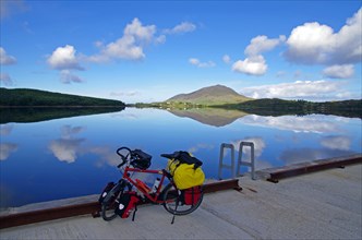 Bicycle in front of reflecting lake
