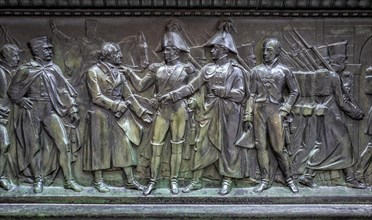 Bronze figures at the base of the monument to Frederick the Great Unter den Linden