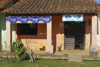 Small shop with chickens on the veranda