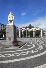 Old city gate with monument to the explorer Goncalo Velho Cabral