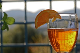 Aperol Spritz in a glass with orange slice