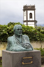 Monument to Prior Evaristo Carreiro Gouveia with Town Hall Tower