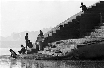 Stairs with pilgrims at the Assi-Ghats of Varanasi
