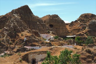 Landscape with cave houses in cave district of Guadix