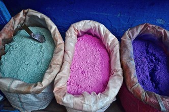 Three bags of colour pigments