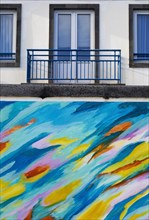 Colourful graffiti on a house facade