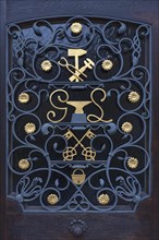 Ornate grid on the entrance door of an Art blacksmith