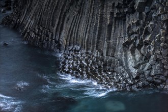 Basalt rock in the sea