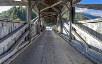 Covered wooden bridge over the Inn
