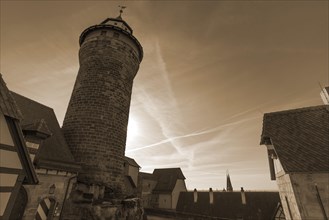 Sinwell Tower on the Kaiserburg in the backlight