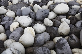 Large round stones on the coast of Rocha da Relva