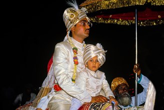 Groom comes riding on a white horse