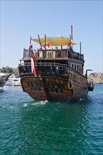Maritime harbour with traditional dhows