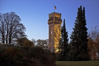 Illuminated observation tower on the Karlshoehe in the evening