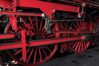 Red rail wheels of a locomotive