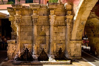 Rimondi Fountain with its three lion heads