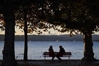 Couple on Lake Zurich in autumn mood