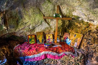 Tomb of the hermit Ioannis Xenos in a rock cave