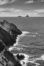 Cliffs with view of the Skellig Islands on the horizon