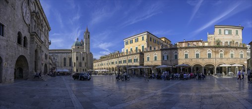 Piazza del Popolo and the Church of San Francesco on the right Loggia dei Mercanti