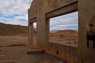 View through windows of a ruin on mine site