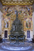 Bronze baptismal font in the church of San Giovanni Battista