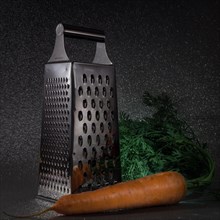 Still Life with Kitchen Grater and Carrot