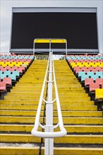 Colourful seats for the spectators at Friedrich Ludwig Jahn Sportpark