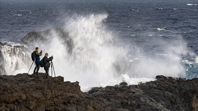 Photographers on the coast at Pozo de Las Calcosas