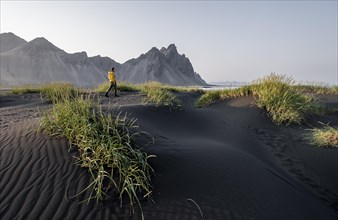 Man walking through dune