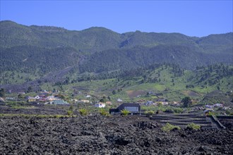 Visitor centre and settlement at the edge of the lava field of the San Juan volcano