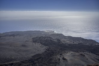View from the volcano Teneguia to the salt flats by the sea