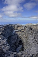 Descent into a lava cave Canos de Fuego