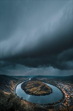 View over the Moselle near Bremm to the thunderstorm and in autumn