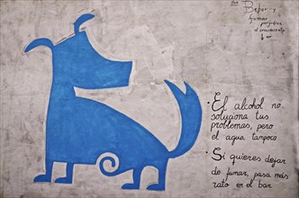 Graffiti with saying and blue dog